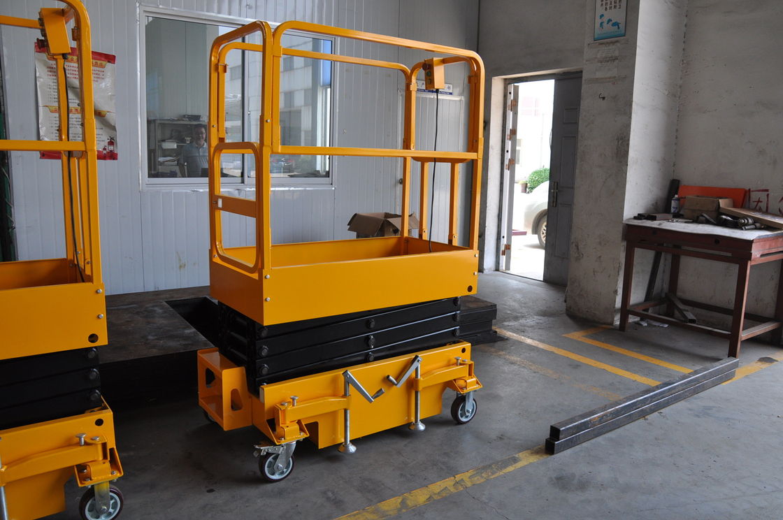 Long Using Period Mini Mobile Scissor Lift With 200Kg Loading And Yellow Color