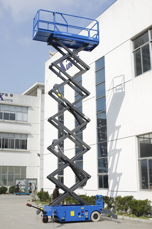 10m 300Kg Scissor Lift with Motorized Device Electric Aerial Work